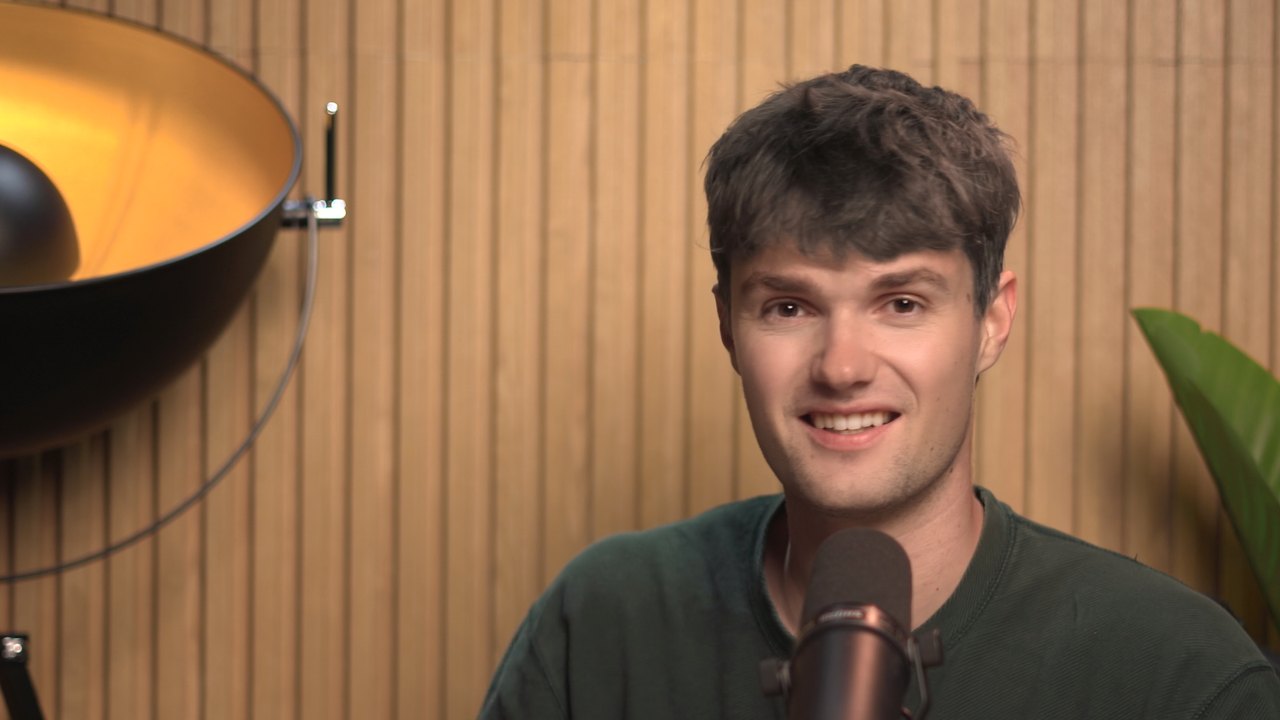 Andreas Kromann Bjærg, founder of SpeechData.ai, speaking at a studio microphone